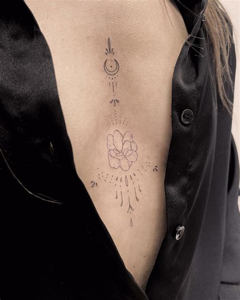 feminine underbreast tattoo|Under Breast Tattoos for Women: Elegant, Meaningful Designs。